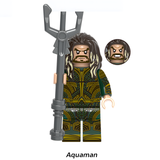 Load image into Gallery viewer, Aquaman custom brick minifigure from DC Justice League, with long brown hair, green-and-gold armor and a trident.