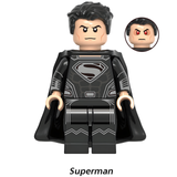 Load image into Gallery viewer, Superman black suit custom brick minifigure from DC Justice League, with a black cape, silver chest emblem and alternate face inset.
