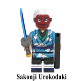 Load image into Gallery viewer, Sakonji Urokodaki custom brick minifigure from Demon Slayer, with a red tengu mask, blue patterned robe and sword.