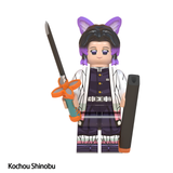 Load image into Gallery viewer, Shinobu Kocho custom brick minifigure from Demon Slayer, with butterfly hair ornaments, patterned haori and slender sword.
