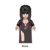 Load image into Gallery viewer, Elvira custom brick minifigure from Elvira, with tall black hair and a black dress with purple trim.