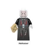 Load image into Gallery viewer, Pinhead custom brick minifigure from Hellraiser, with a pin-covered pale head, black outfit and puzzle-box accessory.