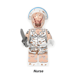 Load image into Gallery viewer, Puppet Nurse custom horror brick figure with a bandaged head, stained white dress and knife accessory.