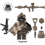 Load image into Gallery viewer, Military Engineer custom brick minifigure with a camouflage cape, toy launcher and shovel accessories.