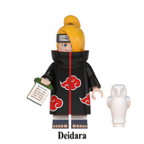 Load image into Gallery viewer, Deidara custom brick minifigure from Naruto, with blond hair, an Akatsuki cloak and white clay hand accessory.