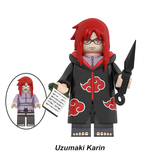 Load image into Gallery viewer, Karin custom brick minifigure from Naruto, with red hair, glasses, an Akatsuki cloak and kunai.