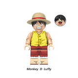 Load image into Gallery viewer, Monkey D. Luffy custom brick minifigure from One Piece, with a straw hat, yellow vest and red shorts.
