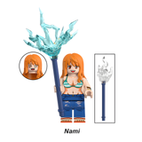 Load image into Gallery viewer, Nami custom brick minifigure from One Piece, with long orange hair, a staff and blue lightning effects.