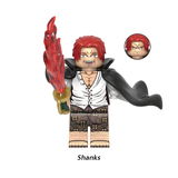 Load image into Gallery viewer, Shanks custom brick minifigure from One Piece, with red hair, a black cape and red sword effect.