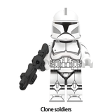 Load image into Gallery viewer, Clone Trooper custom brick minifigure from Star Wars, with white armor, a black visor and toy blaster.