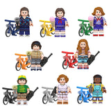Load image into Gallery viewer, Jane Hopper (Known As Eleven), Michael Wheeler (Known As Mike), Dustin Henderson (Known As Dustin), Nancy Wheeler (Known As Nancy), Steve Harrington (Known As Steve), Maxine Mayfield (Known As Max), Erica Sinclair (Known As Erica), and Robin Buckley (Known As Robin) Stranger Things Series 2 LEGO-compatible minifigure set with bikes | custom brick figures
