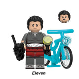 Load image into Gallery viewer, Jane Hopper (Known As Eleven) Stranger Things LEGO-compatible minifigure with bike