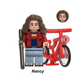 Load image into Gallery viewer, Nancy Wheeler (Known As Nancy) Stranger Things LEGO-compatible minifigure with bike