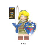 Load image into Gallery viewer, Link custom brick minifigure from The Legend of Zelda, wearing an olive-green tunic with a sword and blue Hylian shield.