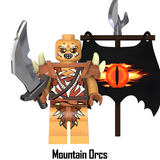 Load image into Gallery viewer, Mountain Orc custom brick minifigure from The Lord of the Rings, with orange skin, a curved blade and Eye of Sauron banner.