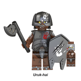 Load image into Gallery viewer, Uruk-hai axe warrior custom brick minifigure from The Lord of the Rings, with a black helmet, axe and gray shield with a white hand emblem.